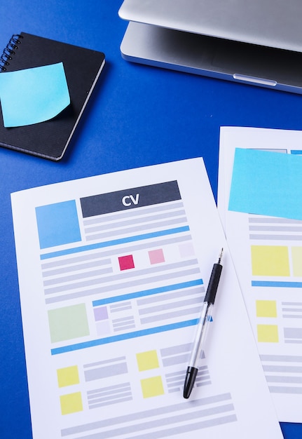 Resume documents on a desk